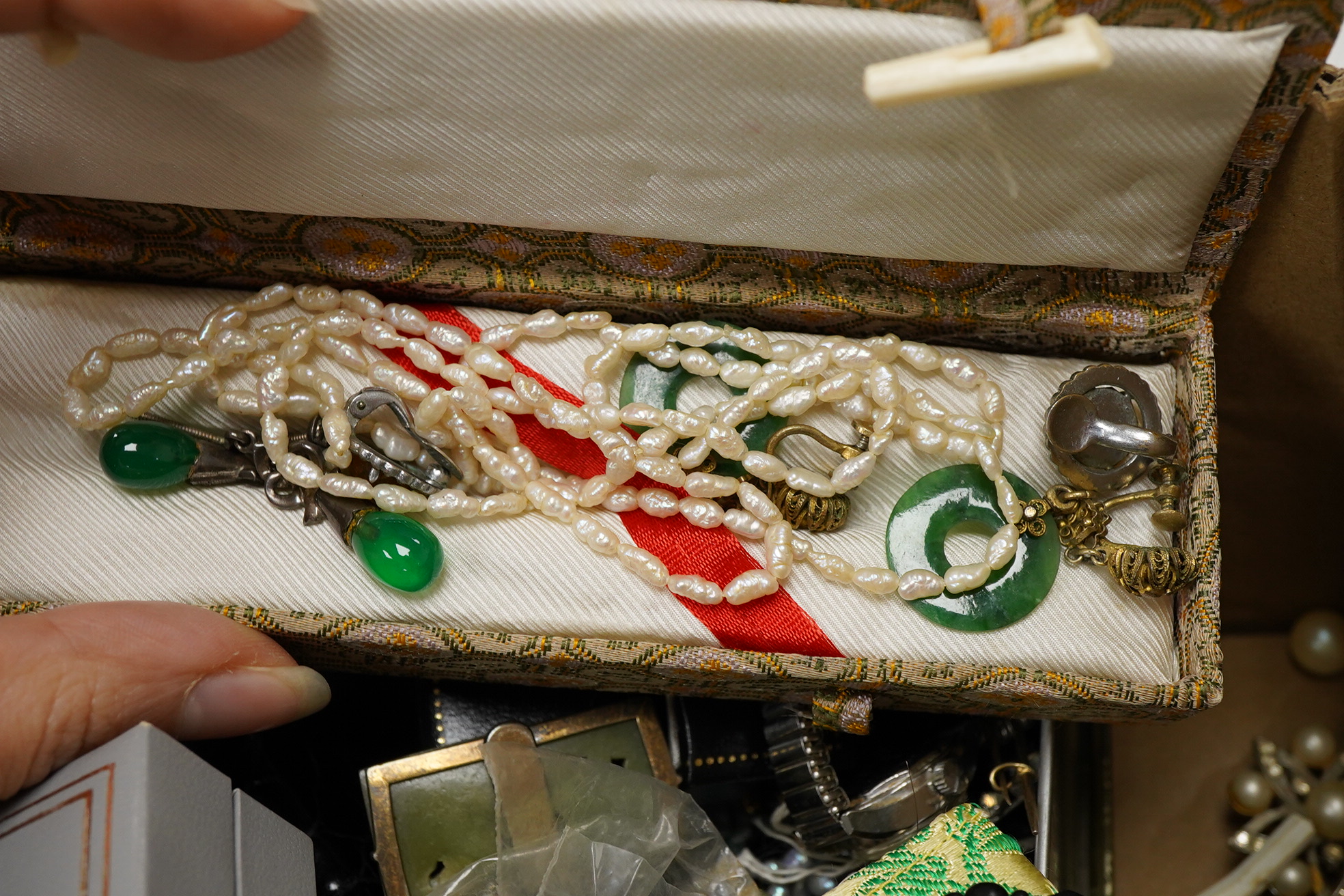A quantity of assorted mainly costume jewellery, including paste brooch, facetted jet bead necklace, enamelled earrings, wrist watches, compact, lighters, etc.